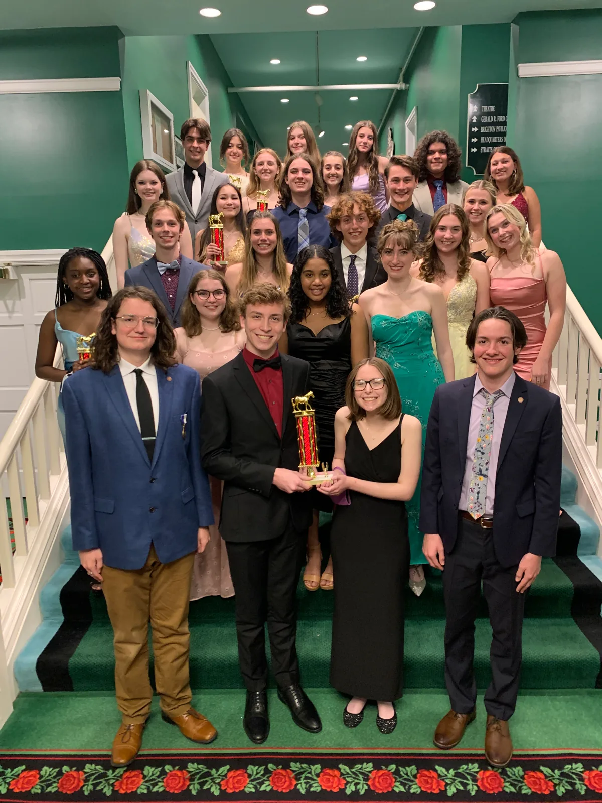 A large group of Mackinac 2022 finalists on the Grand Hotel staircase