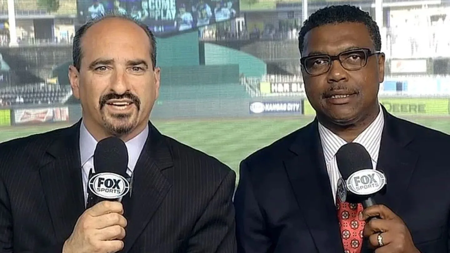 Mario Impemba and Rod Allen hold Fox Sports microphones at a ballpark